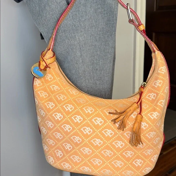 Dooney and Burke EUC. salmon color, canvas, swing style bag, key fob,storage - Picture 3 of 14